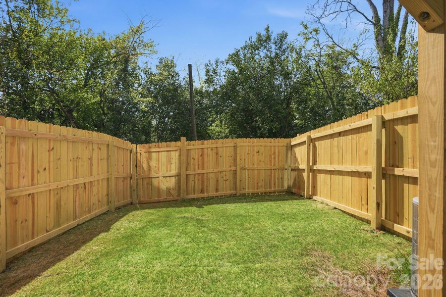 Exterior details and patio area of a home in , Charlotte (Image 21).