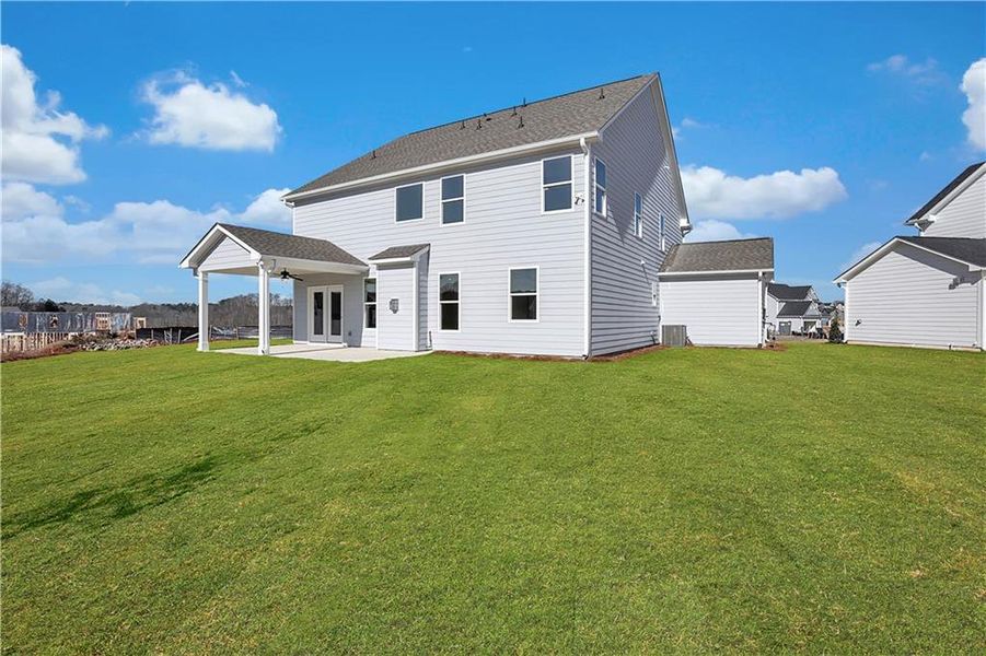 Exterior details and patio area of a home in Twin Lakes, Hoschton (Image 33).