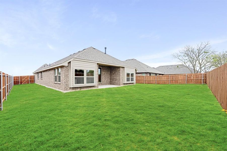 Exterior details and patio area of a home in The Oaks, Red Oak (Image 3). Exterior details and patio area of a home in The Oaks, Red Oak (Image 3).