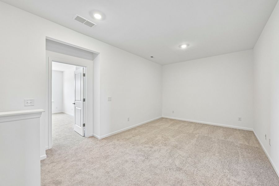 Spacious, unfurnished interior of a new home in Terraces at the Exchange, Fort Mill (Image 19).