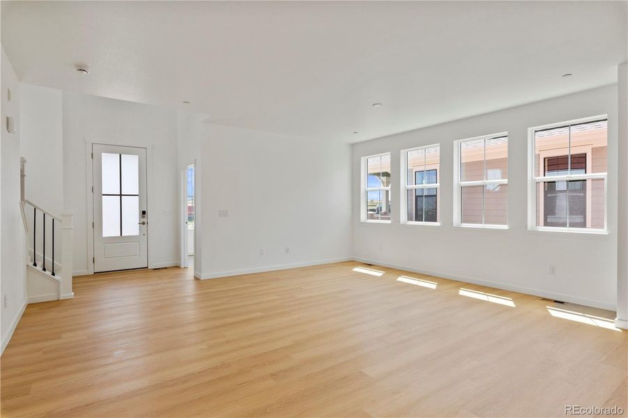 Entry way with office and game room