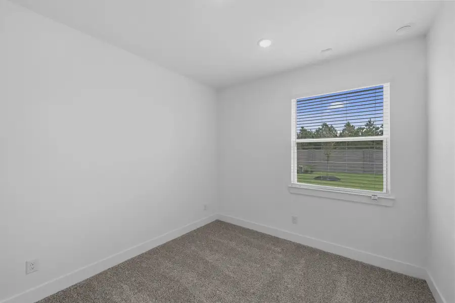 Representative unfurnished interior of a home built from the Margaux by Chesmar Homes in Bridgeland Chateau, Cypress (Image 47).