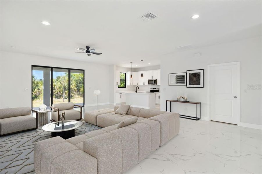 Furnished interior view inside a new home in , Port Charlotte (Image 9).