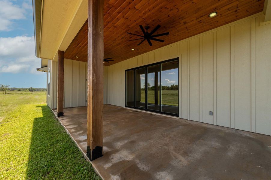 View of patio featuring a ceiling fan
