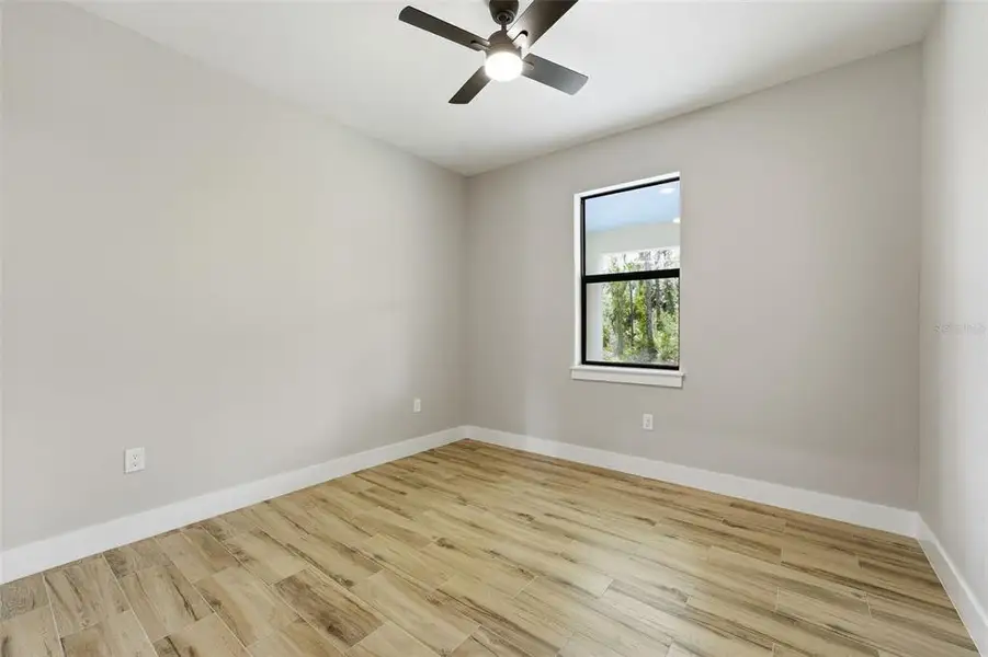 Spacious, unfurnished interior of a new home in , Port Charlotte (Image 33).