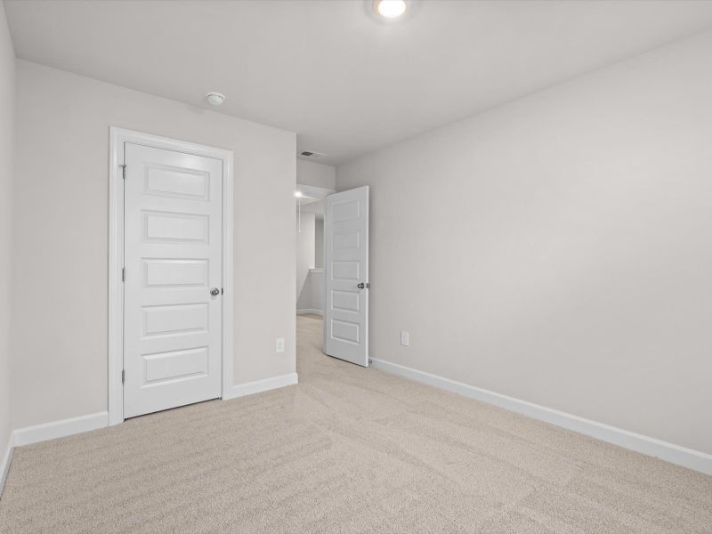 Spacious, unfurnished interior of a new home in Crossing at Abner Creek Townes, Greer (Image 15).