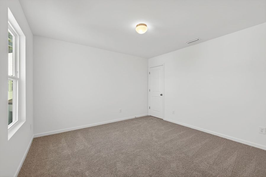 Spacious, unfurnished interior of a new home in Nathans Ridge, Lillington (Image 21).