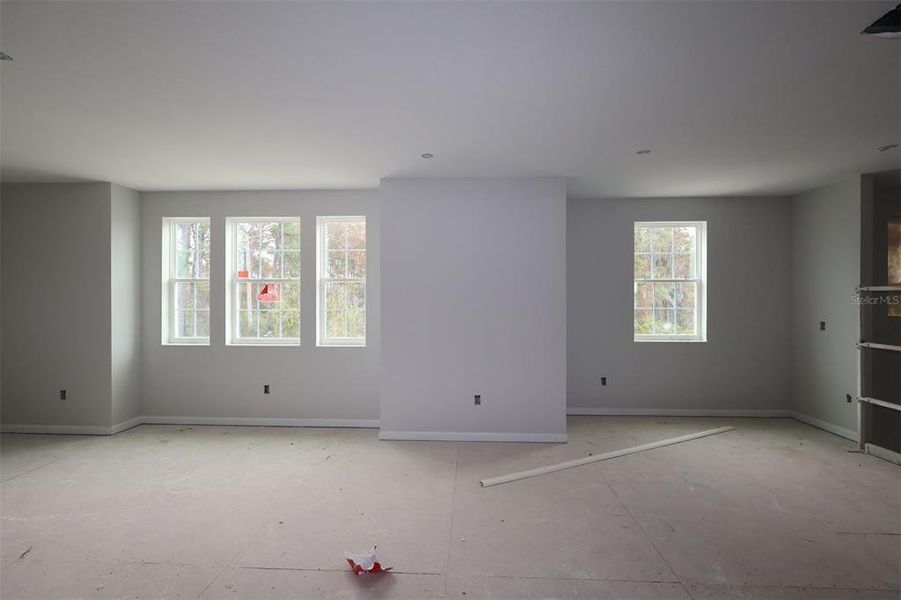 In-progress construction of a new home in Lake Star at Ovation, Winter Garden, FL (Image 14).