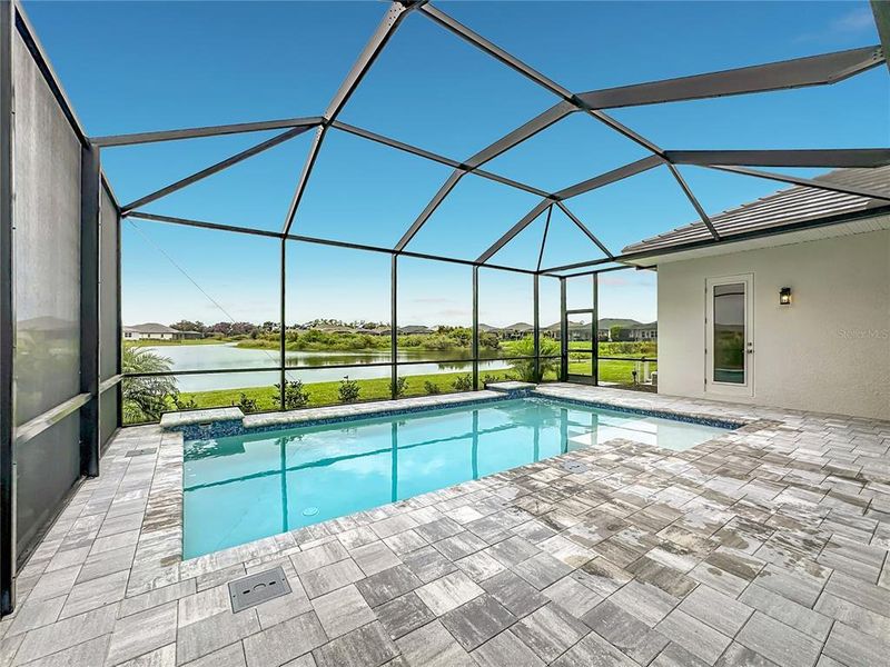 Exterior details and patio area of a home in River Preserve Estates, Parrish (Image 25).