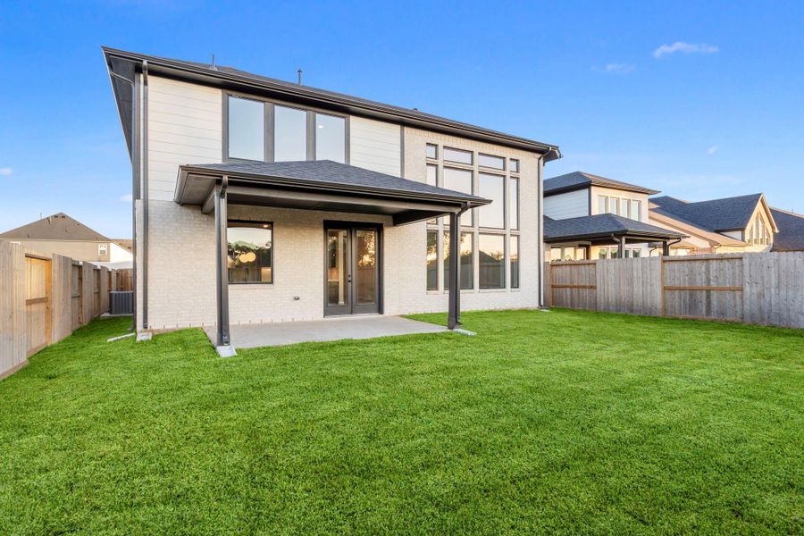 Exterior details and patio area of a home in Sienna 45', 50', Missouri City (Image 22). Exterior details and patio area of a home in Sienna 45', 50', Missouri City (Image 22).