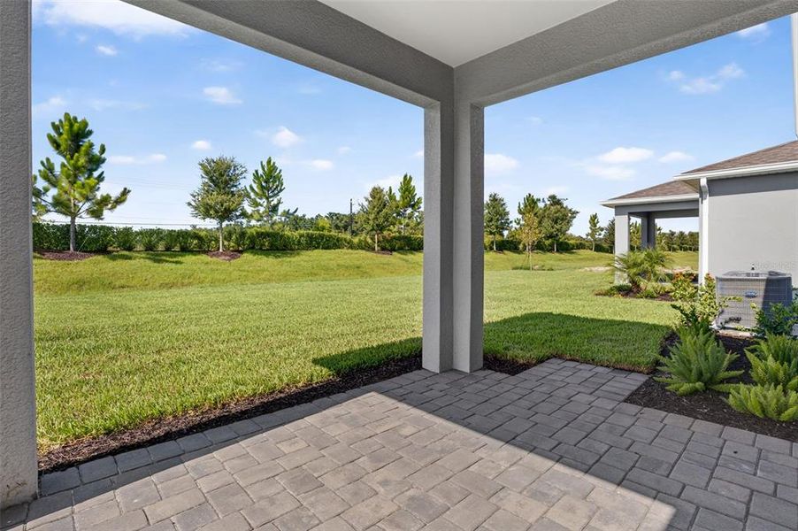 Exterior details and patio area of a home in Windwater, Parrish (Image 3).