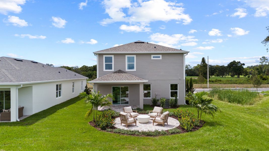 Representative exterior photo of a completed home built from the Ponte Verde by DRB Homes in Willowbrook North, Winter Haven, FL (Image 35). Representative exterior photo of a completed home built from the Ponte Verde by DRB Homes in Willowbrook North, Winter Haven, FL (Image 35).