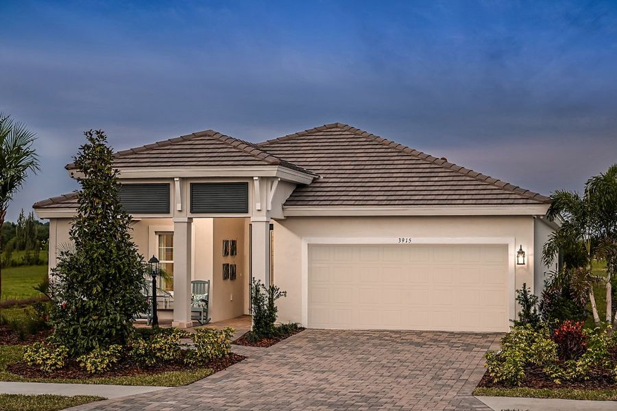 Representative exterior photo of a completed home built from the Sandpiper by Homes by WestBay in Star Farms at Lakewood Ranch, Lakewood Ranch, FL (Image 25). Representative exterior photo of a completed home built from the Sandpiper by Homes by WestBay in Star Farms at Lakewood Ranch, Lakewood Ranch, FL (Image 25).