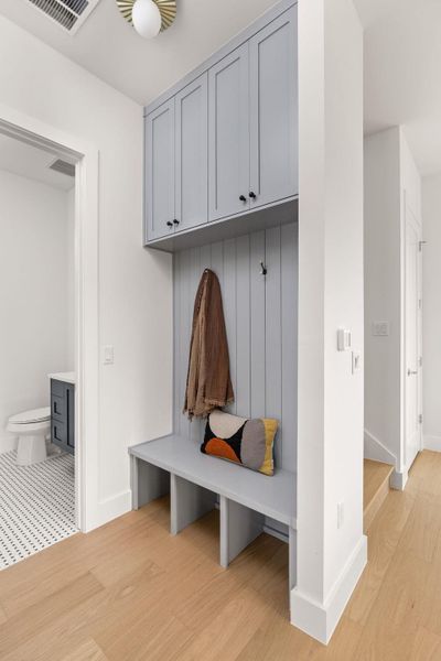 Mudroom featuring light wood-type flooring and baseboards Mudroom featuring light wood-type flooring and baseboards