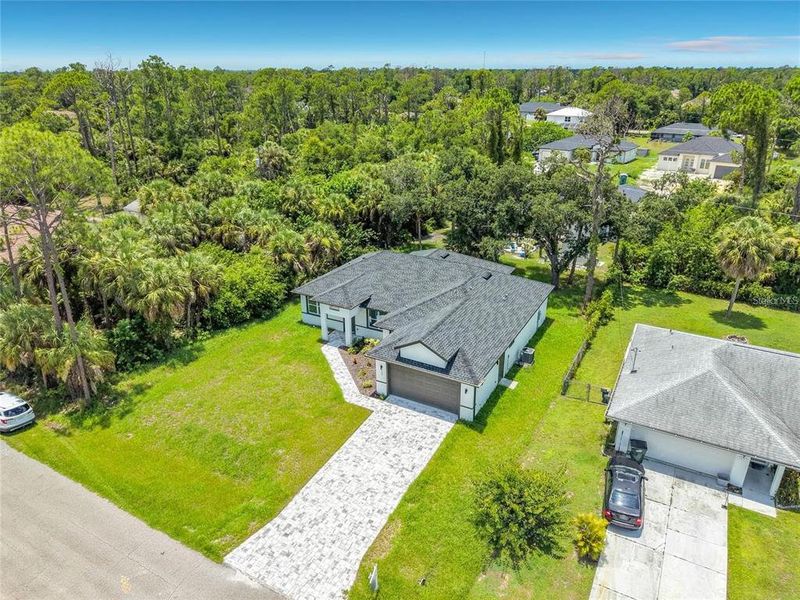 Front exterior of a new home in , North Port, FL, highlighting curb appeal (Image 21).