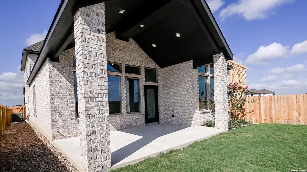 Exterior details and patio area of a home in Legacy at Lake Dunlap, New Braunfels (Image 22).
