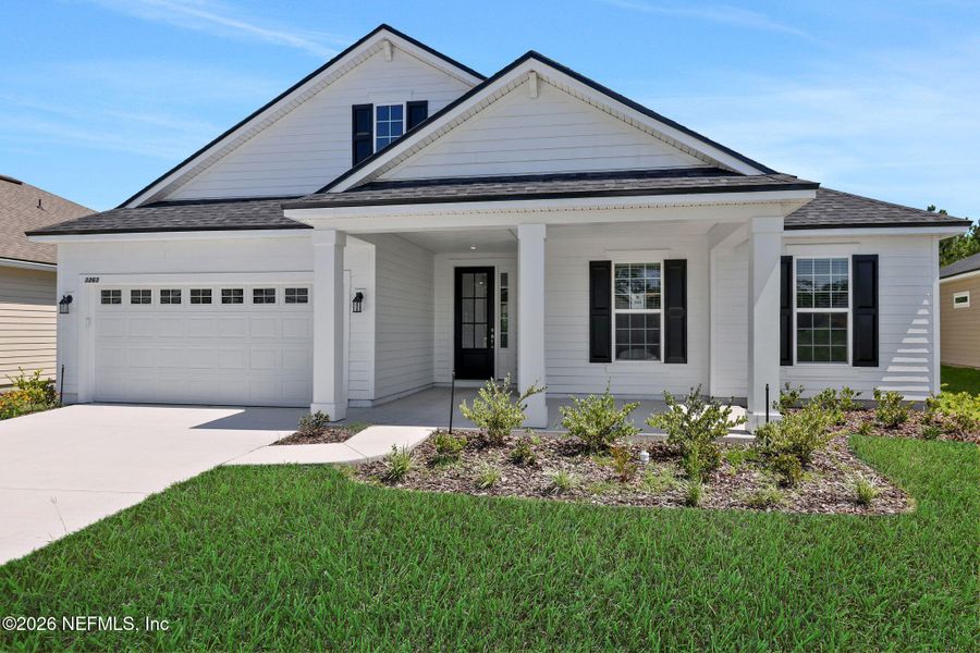Front exterior of a new home in Hyland Trail, Green Cove Springs, FL, highlighting curb appeal (Image 27).