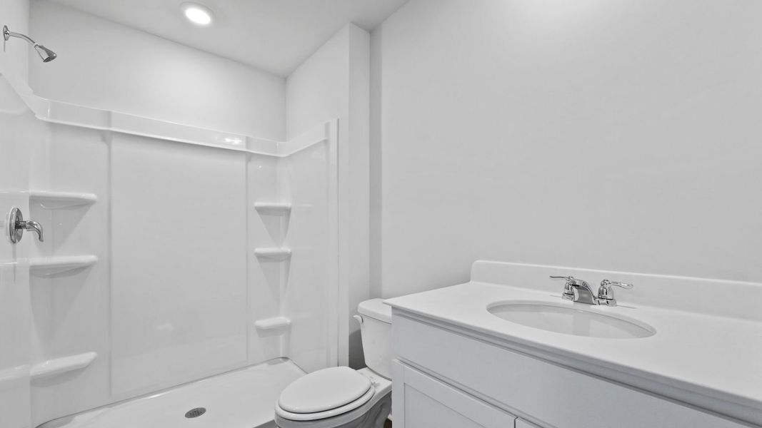 Representative furnished interior of a home built from the DOWNING by D.R. Horton in Saltgrass Landing, Winnabow (Image 11).