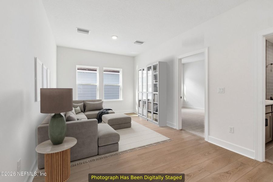 Furnished interior view inside a new home in Reflections 40' Front Load, Ponte Vedra (Image 8).
