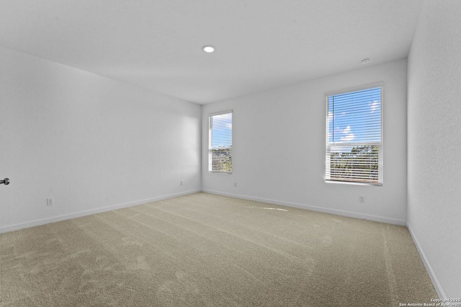 Spacious, unfurnished interior of a new home in Waterwheel: Coastline Collection, San Antonio (Image 10).