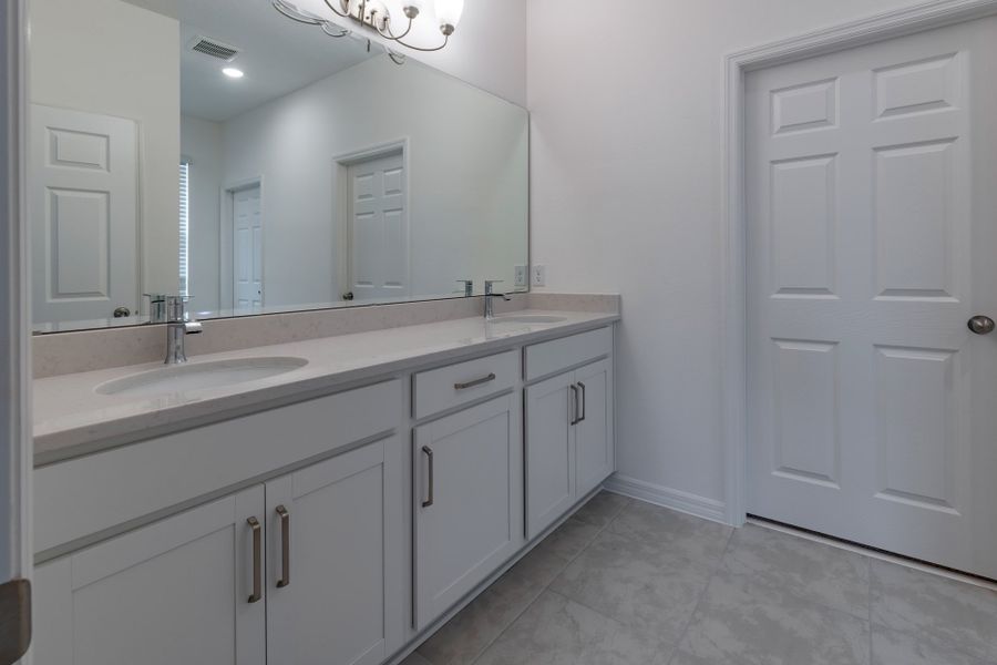 Modern Primary Bathroom with Stylish Features in Central Florida House