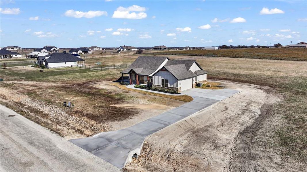 Front exterior of a new home in , Cresson, TX, highlighting curb appeal (Image 24).