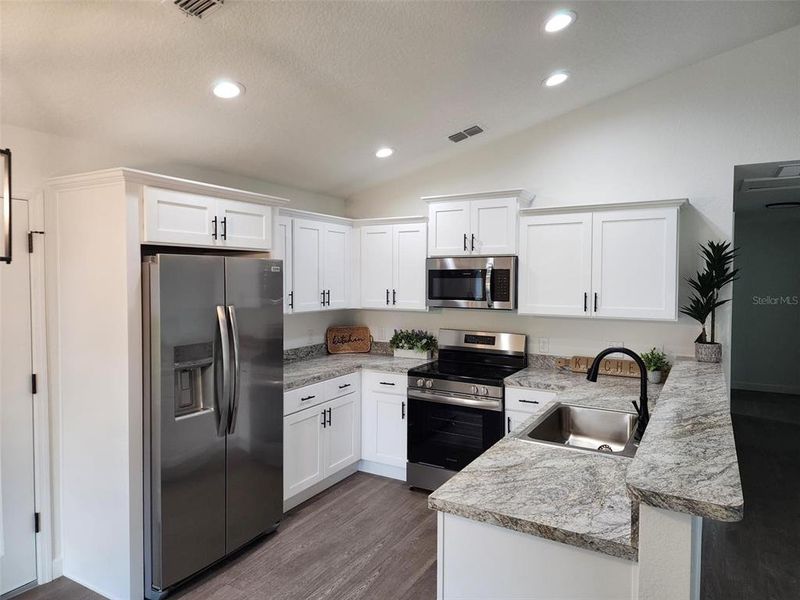 Furnished interior view inside a new home in , Dunnellon (Image 3).