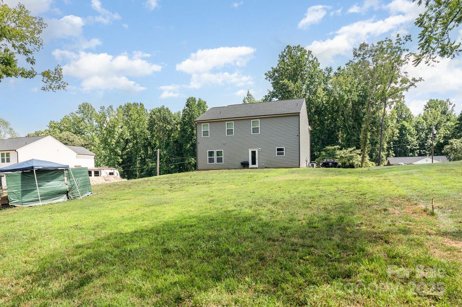 Front exterior of a new home in , Gastonia, NC, highlighting curb appeal (Image 21). Front exterior of a new home in , Gastonia, NC, highlighting curb appeal (Image 21).