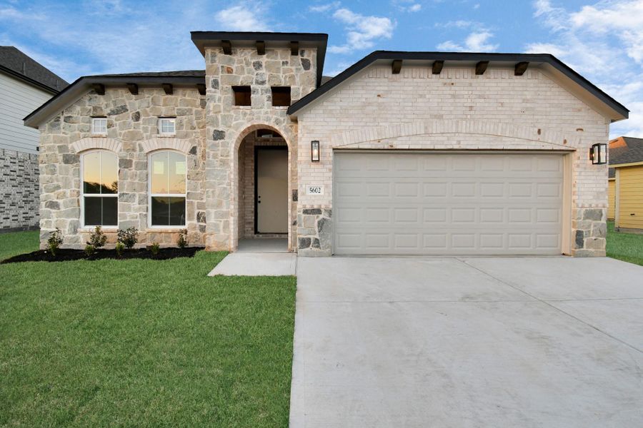 Example of completed home with similar plan. As-built colors and selections may vary.