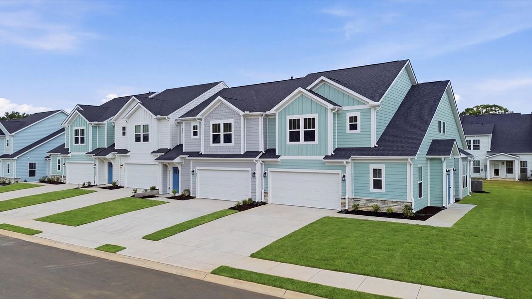 Exclusive DRB Homes exterior with balanced proportions and vibrant curb appeal at Village at Midway Exclusive DRB Homes exterior with balanced proportions and vibrant curb appeal at Village at Midway