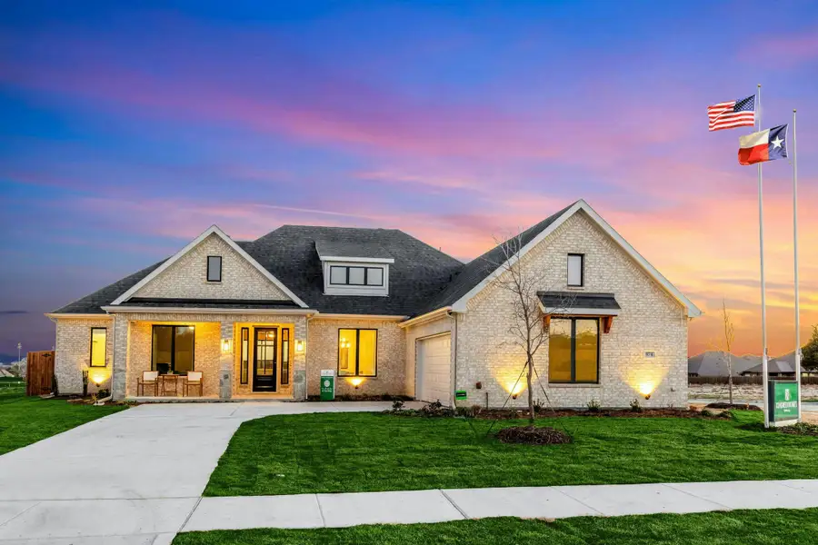 Front exterior of a new home in Kentsdale Farms, DeSoto, TX, highlighting curb appeal (Image 2).
