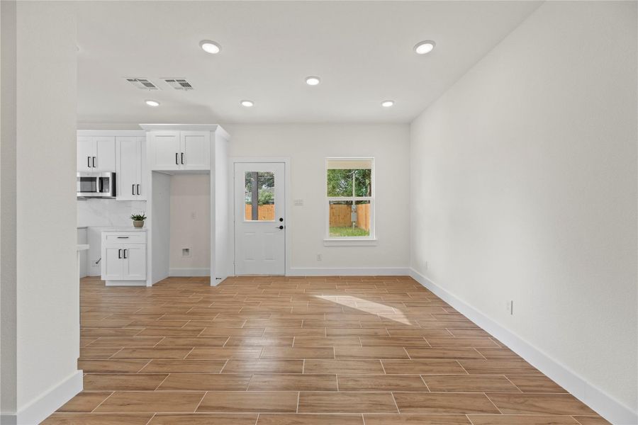 Everyday dining is stylish and bright in the breakfast area. Eat heart-shaped waffles and sausage with the kiddos, as you admire the view of the backyard! Everyday dining is stylish and bright in the breakfast area. Eat heart-shaped waffles and sausage with the kiddos, as you admire the view of the backyard!