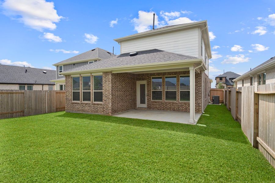 Front exterior of a new home in Ellerden, Tomball, TX, highlighting curb appeal (Image 13). Front exterior of a new home in Ellerden, Tomball, TX, highlighting curb appeal (Image 13).