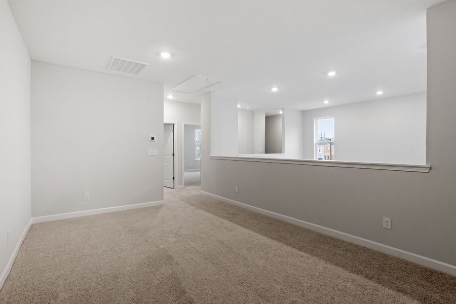 Spacious, unfurnished interior of a new home in Ovation at Sweetbrier, Durham (Image 20).