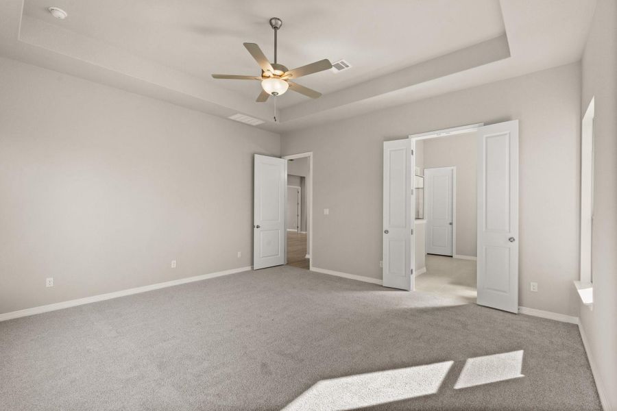 Primary Bedroom with French Doors to Primary Bath