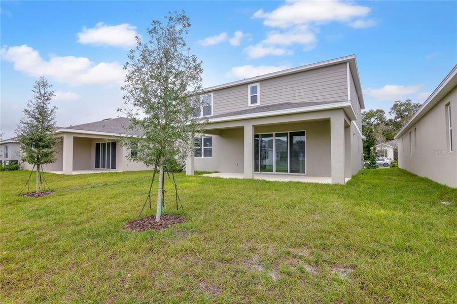 Exterior details and patio area of a home in Seasons at Grandview Gardens, Deland (Image 4). Exterior details and patio area of a home in Seasons at Grandview Gardens, Deland (Image 4).