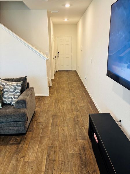 Entryway featuring wood-finish flooring and recessed lighting. Entryway featuring wood-finish flooring and recessed lighting.