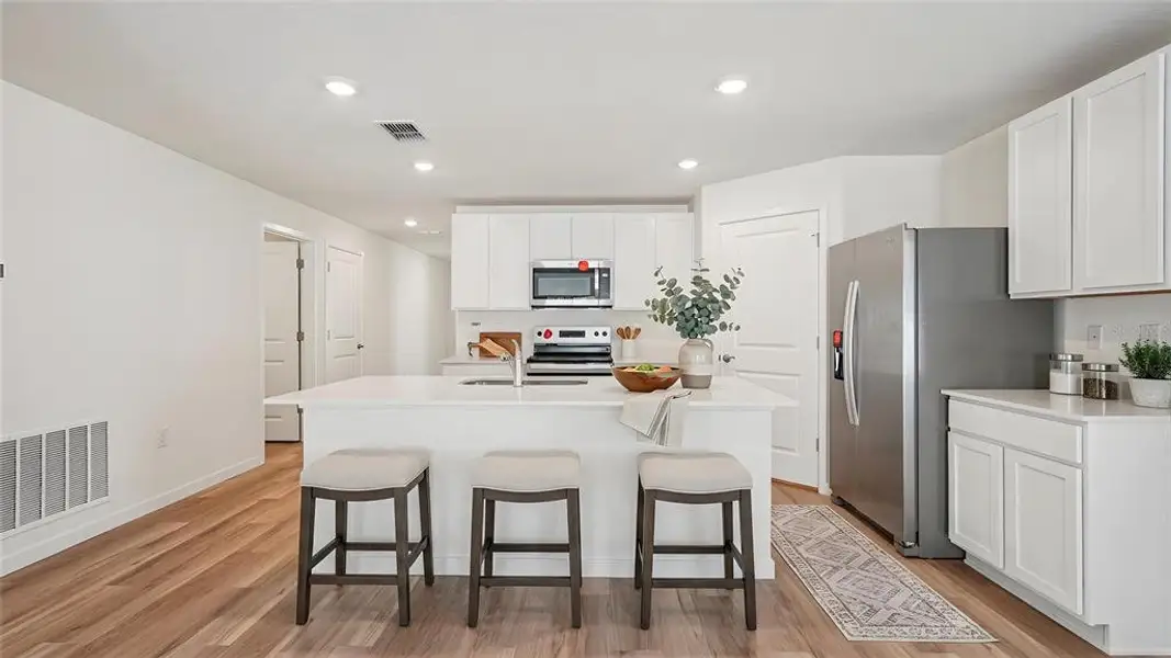 Furnished interior view inside a new home in Sunset Hills, Summerfield (Image 4).