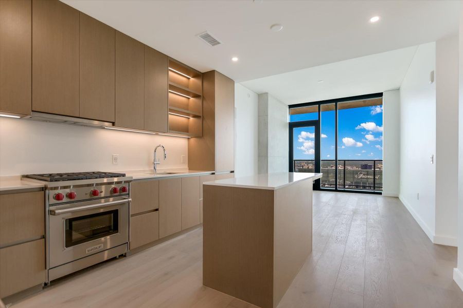 Photos shown are of the same floor plan three floors higher.