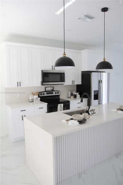 Furnished interior view inside a new home in , Lehigh Acres (Image 16).