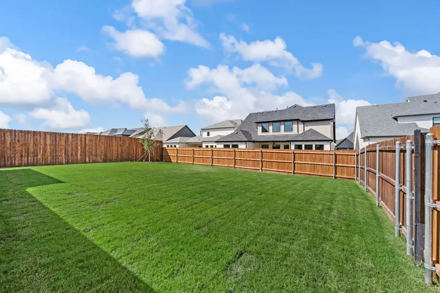 Exterior details and patio area of a home in Parks of Aledo, Aledo (Image 4).