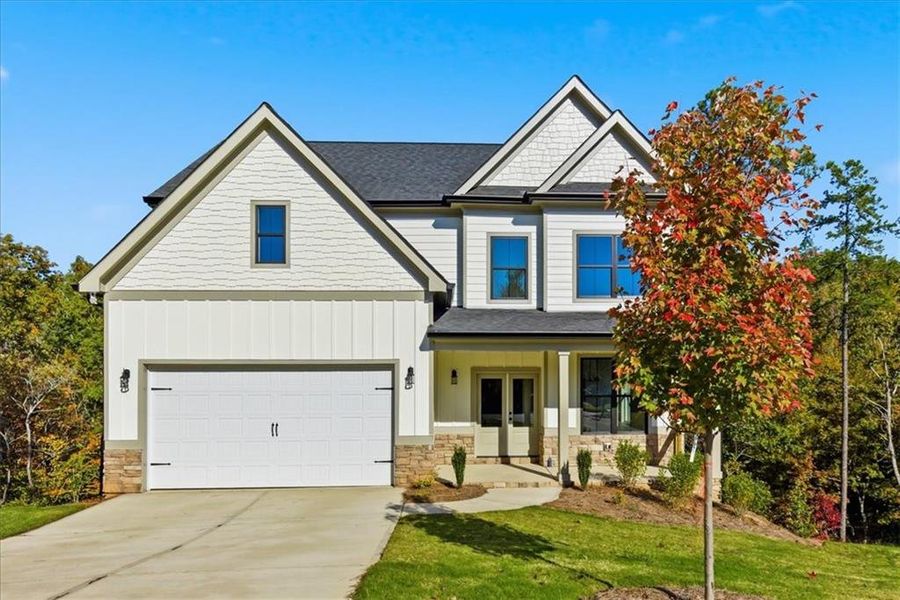 Front exterior of a new home in , Cartersville, GA, highlighting curb appeal (Image 1).