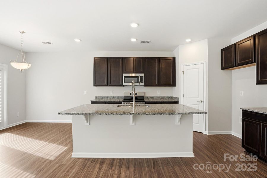 Furnished interior view inside a new home in Villas at Prestwick, Mooresville (Image 14).