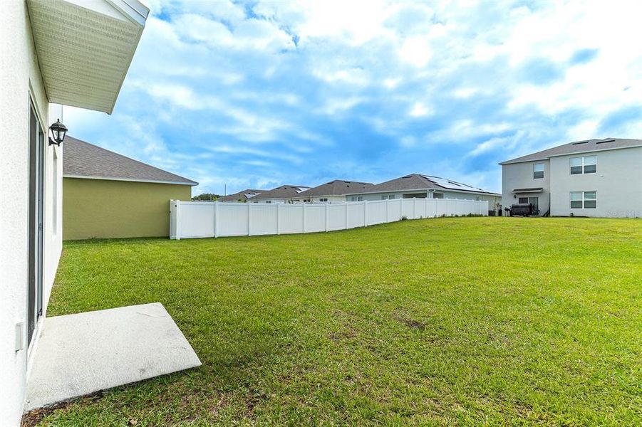 Exterior details and patio area of a home in Harmony at Lake Eloise, Winter Haven (Image 2). Exterior details and patio area of a home in Harmony at Lake Eloise, Winter Haven (Image 2).