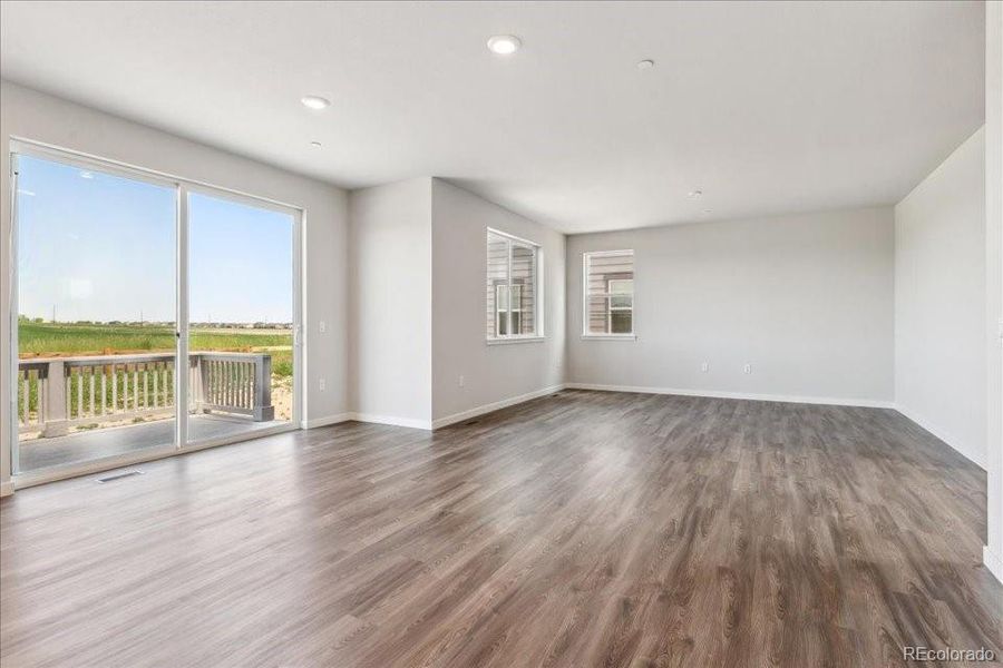 Spacious, unfurnished interior of a new home in Floret Collection at Parkdale Commons, Lafayette (Image 13).
