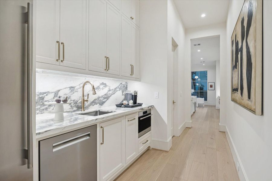 A hosting-friendly scullery includes third Wof oven, second dishwasher, and second Sub-Zero fridge. A hosting-friendly scullery includes third Wof oven, second dishwasher, and second Sub-Zero fridge.