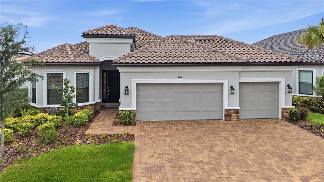 Front exterior of a new home in , Palmetto, FL, highlighting curb appeal (Image 26). Front exterior of a new home in , Palmetto, FL, highlighting curb appeal (Image 26).