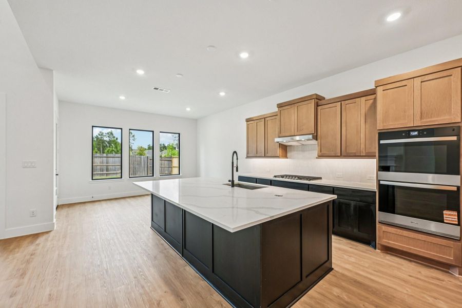 Furnished interior view inside a new home in Evergreen 60', Conroe (Image 7).