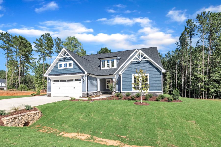 Representative exterior photo of a completed home built from the The Bradley by RobuckHomes in Baylee Ridge, Selma, NC (Image 49). Representative exterior photo of a completed home built from the The Bradley by RobuckHomes in Baylee Ridge, Selma, NC (Image 49).