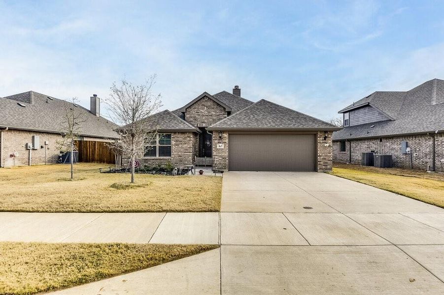 One story, custom JOHN HOUSTON, 3 bedroom, 2 bath with open concept and covered back patio.